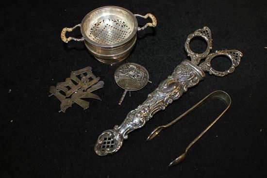 Edwardian silver handled scissors and case, silver tea stainer on stand, pair of tongs and 2 x Chinese silver menu holders